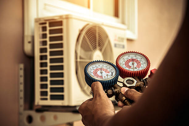 Professional Air Conditioning Service technician working in Clayton, CA
